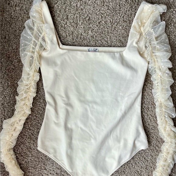 Free People Tops - free people bodysuit NEVER worn! Size S